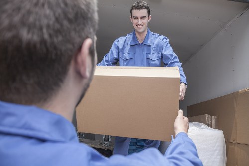 Professional man with van service handling items in Wanstead