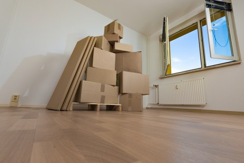 Removal team loading furniture from a residential property in Wanstead
