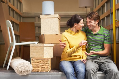 Professional movers loading household items for a move in Wanstead