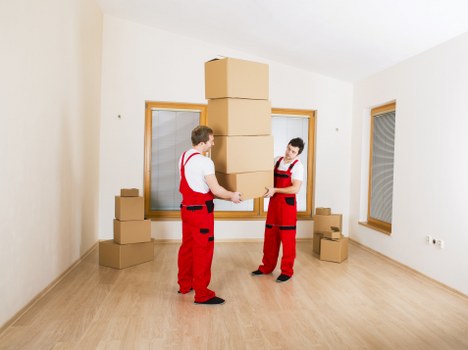 Professional removal van loading boxes and furniture in Wanstead